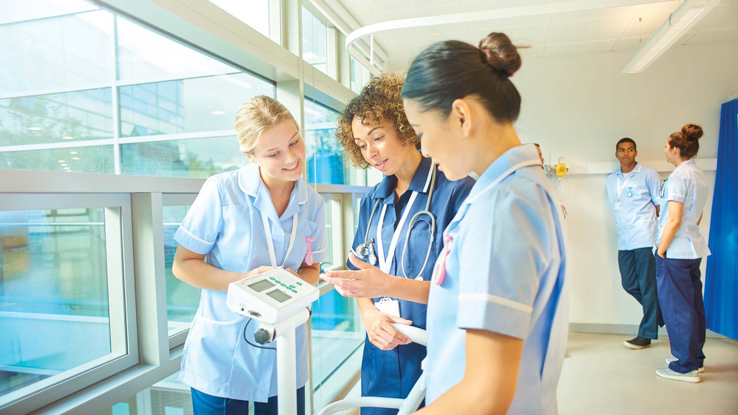 Nurses talking in atrium